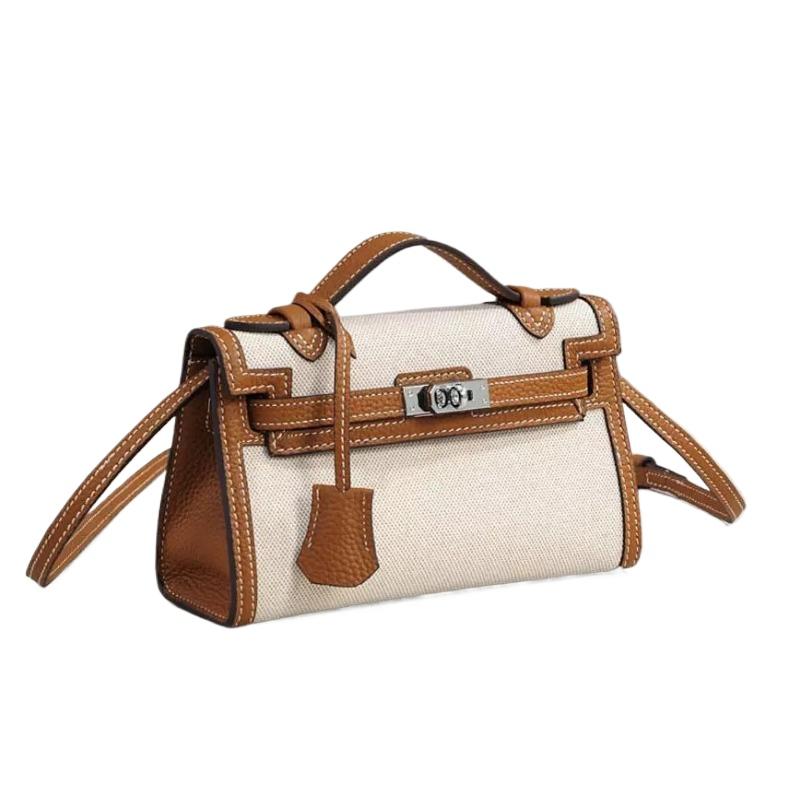 2025 new canvas generation Kelly bag fashion shoulder crossbody portable small square bag casual lock leather women's bag