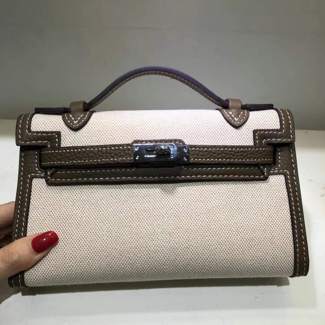 2025 new canvas generation Kelly bag fashion shoulder crossbody portable small square bag casual lock leather women's bag