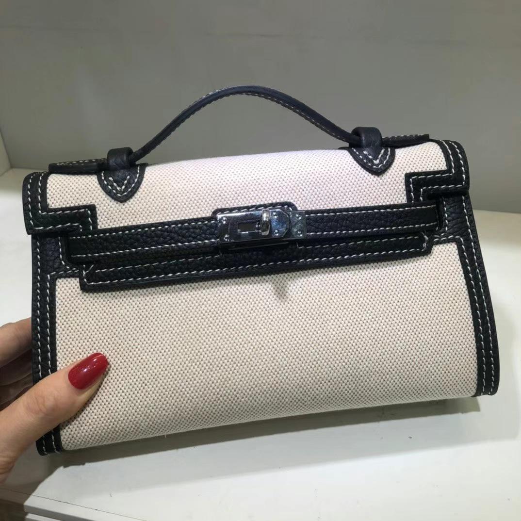 2025 new canvas generation Kelly bag fashion shoulder crossbody portable small square bag casual lock leather women's bag