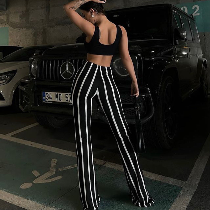 2025 spring and summer fashion street shooting vertical stripe printing micro-speaker black and white contrasting color casual trousers women