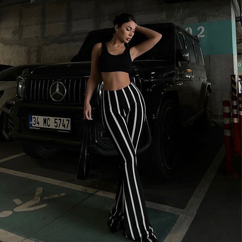 2025 spring and summer fashion street shooting vertical stripe printing micro-speaker black and white contrasting color casual trousers women